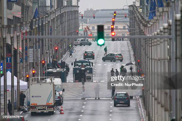 Security perimeter fence stands on Wetstraat, in Brussels, Belgium, on March 23, 2016. Police continue investigations after yesterday's explosions at...