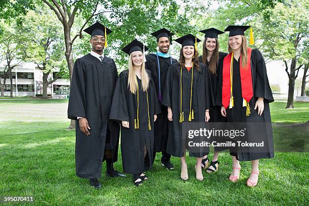 Graduaates Happy Group Of Graduates Looking At Camera Photos and Premium High Res ...