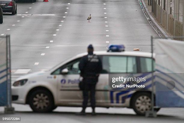 Security perimeter fence stands on Wetstraat, in Brussels, Belgium, on March 23, 2016. Police continue investigations after yesterday's explosions at...