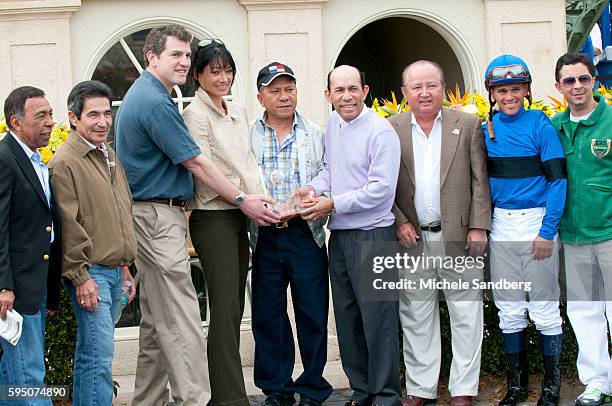 January 19, 2013 WINNING RACE - JOCKEY JAVIER CASTELLANO, RIDING HORSE REGALO MIA. ANGEL CORDERO JR., LAFFIT PINCAY JR., JACINTO VASQUEZ, LAFFIT...