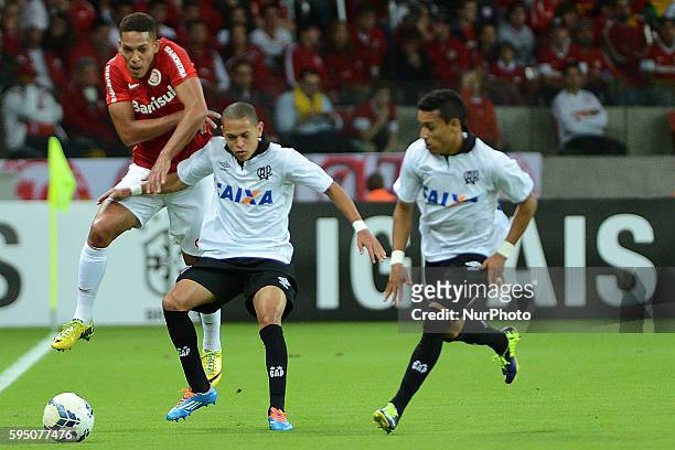 Arbitro Sandro Meira Ricci and Alex in the match between Internacional and Atletico Paranaense, for Week of the Brazilian League played at the Beira...