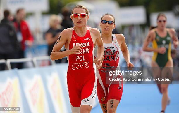 Triathlon - Run Stage - Maria Czesnik and Kathy Tremblay through the transition area Elite Women ITU World Championship Dextro Energy Triathlon...