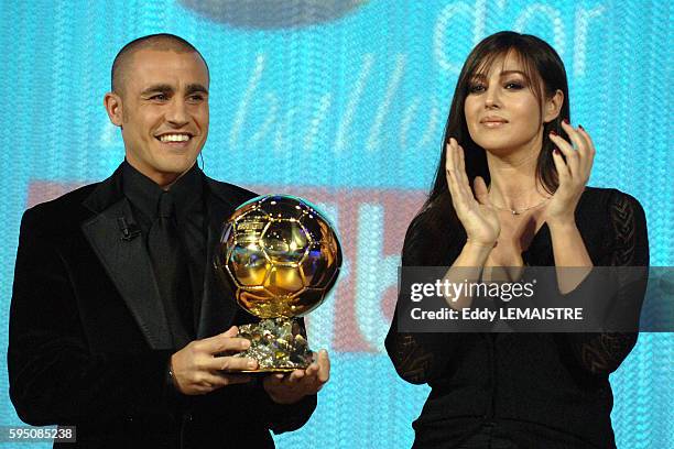 Italian actress Monica Bellucci and Italian soccer player of Real Madrid and captain of the Italian team that won the FIFA World Cup 2006 Fabio...