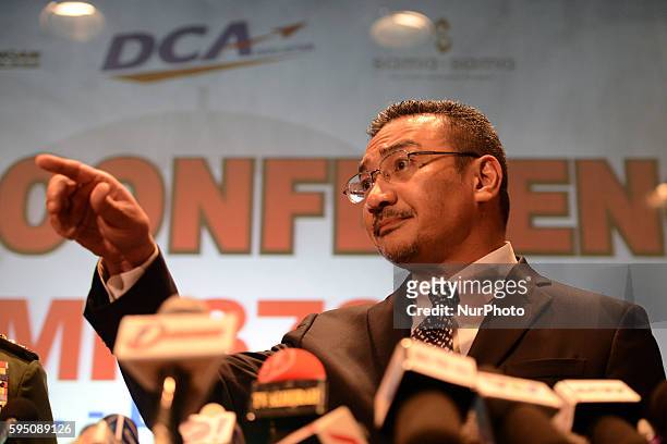 Hishamuddin Tun Hussein acting Minister of Transportation answers questions during the final press conference for the missing flight, MH370 as it...