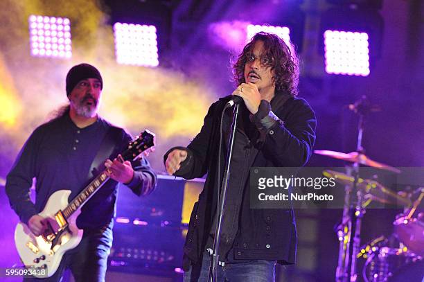 Kim Thayil and Chris Cornell of Soundgarden perform in concert at the Guitar Center Direct TV live stream show from a roof top party during South By...