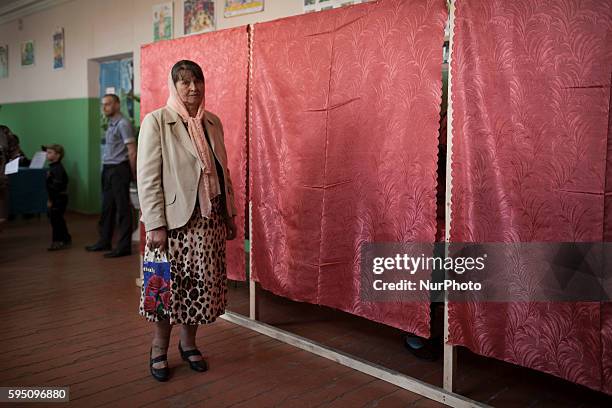 Citizens of Slavyansk vote in the referendum on independence from Ukraine organized by the People's Republic of Donetsk on May 11th, 2014.