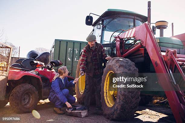 tractor maintenance - agricultural equipment stock pictures, royalty-free photos & images