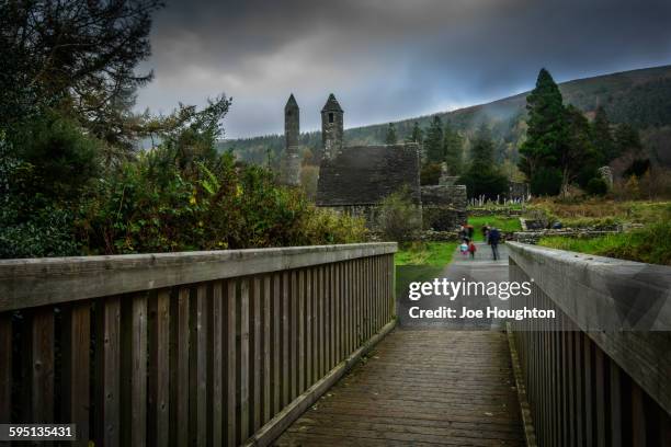 glendalough - view from the bridge - irish-round-towers stock pictures, royalty-free photos & images