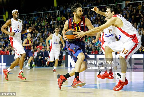 Juan Carlos Navarro and Kostas Sloukas in the match between FC Barcelona and Olympiacos, for the week 10 of the Top 16 Euroleague basketball match at...