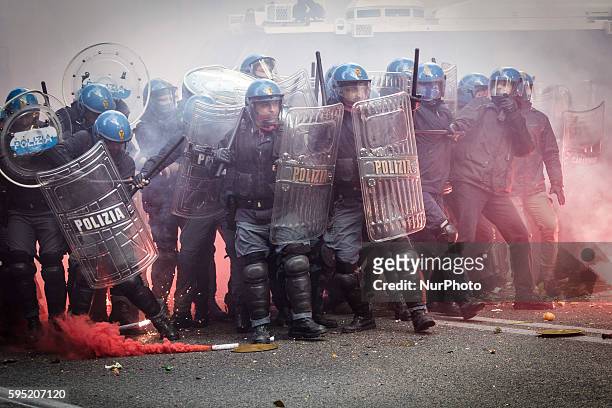 Rome, Italy â€" April 12, 2014: Demonstrators clash with police during an anti-austerity demonstration in Rome. Thousands protesters, from all over...