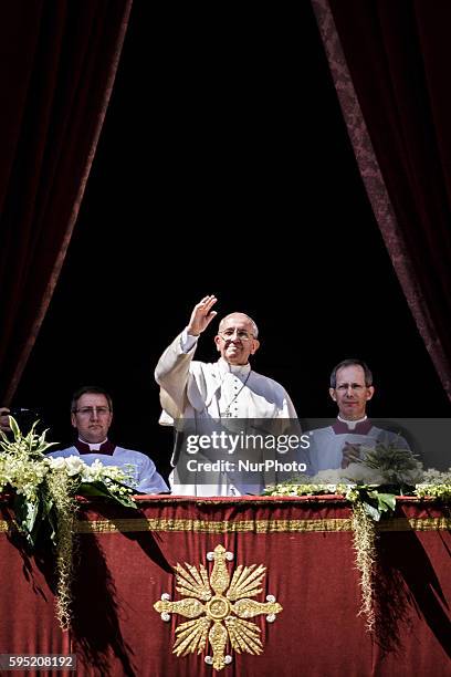 Vatican City, Vatican – April 20, 2014: Pope Francis delivers the traditional 'Urbi et Orbi' blessing , from the central Loggia of St. Peter's...