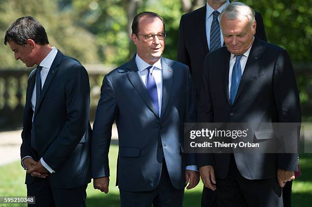 French Prime Minister Manuel Valls, French president Francois Hollande, French Foreign Minister Jean-Marc Ayrault, pose for a family picture outside...