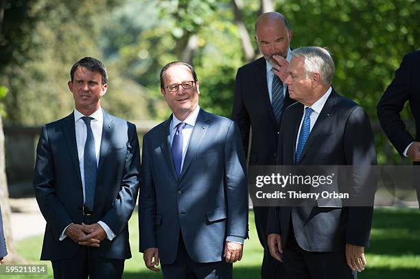 French Prime Minister Manuel Valls, French president Francois Hollande, French Foreign Minister Jean-Marc Ayrault, pose for a family picture during a...