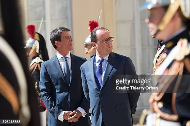 French Prime Minister Manuel Valls and French President Francois Hollande ahead of a meeting with European Social Democrats on August 25, 2016 in la...