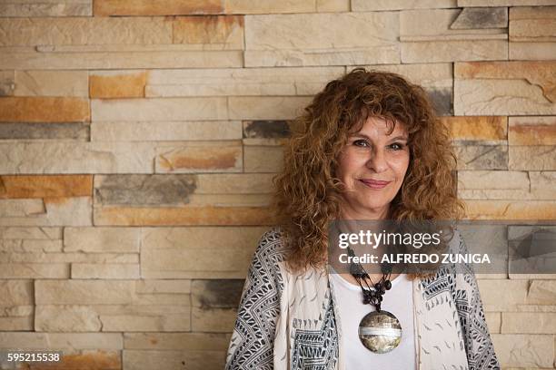 Nicaraguan author, novelist and poet Gioconda Belli poses before an interview with AFP in Managua on August 23, 2016. Belli referred to the upcoming...