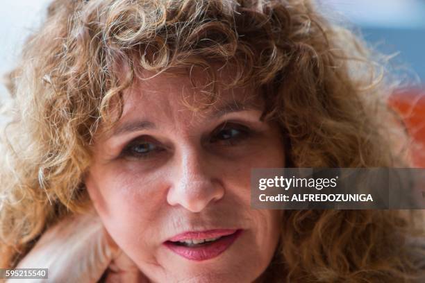 Nicaraguan author, novelist and poet Gioconda Belli speaks during an interview with AFP in Managua on August 23, 2016. Belli referred to the upcoming...