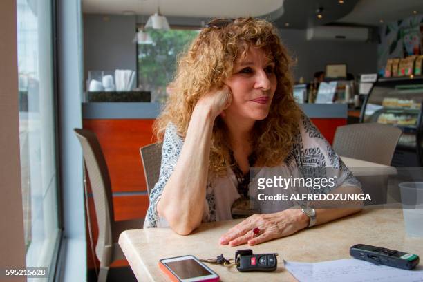 Nicaraguan author, novelist and poet Gioconda Belli speaks during an interview with AFP in Managua on August 23, 2016. Belli referred to the upcoming...