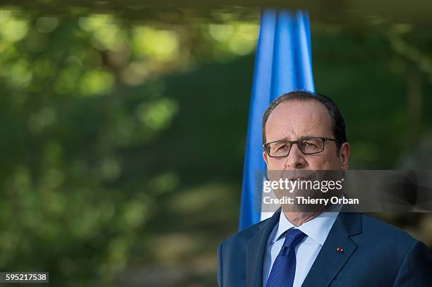 French President Francois Hollande, speaks to the media during a press conference following a meeting with European Social Democrats on August 25,...