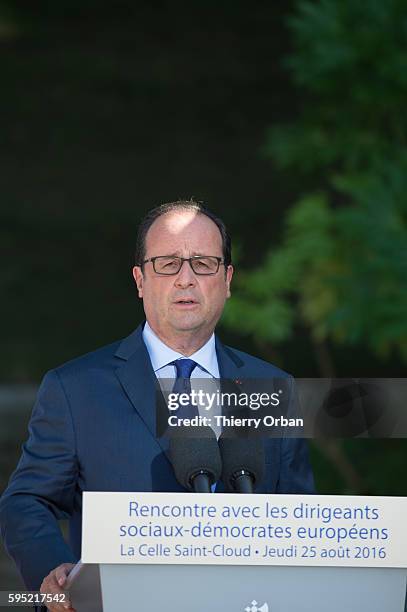 French President Francois Hollande, speaks to the media during a press conference following a meeting with European Social Democrats on August 25,...