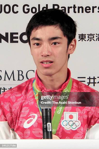 Men's Artistic Gymanstics Vault bronze medalist Kenzo Shirai speaks during a press conference at the Japan House on August 16, 2016 in Rio de...