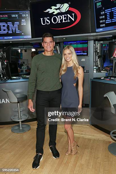 World number 6 ranked men's professional tennis player Milos Raonic and Danielle Knudson attend the United States Tennis Association rings the NYSE...