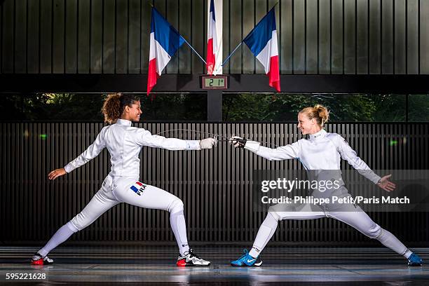 Fencers Ysaora Thibus and Astrid Guyart are photographed for Paris Match on June 30, 2016 in Paris, France.