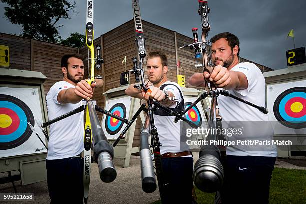 Archers Lucas Daniel, Jean-Charles Valladont and Pierre Plihon are photographed for Paris Match on June 30, 2016 in Paris, France.