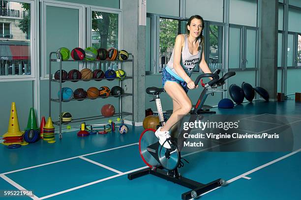 Former tennis champion and broadcaster Marion Bartoli is photographed for Paris Match on July 30, 2016 in Paris, France.