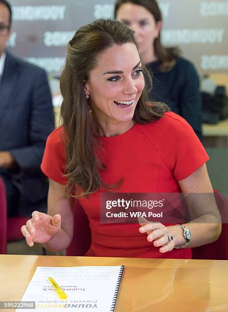 Catherine, Duchess of Cambridge visits a helpline service run by one of the eight charity partners of Heads Together on August 25, 2016 in London,...