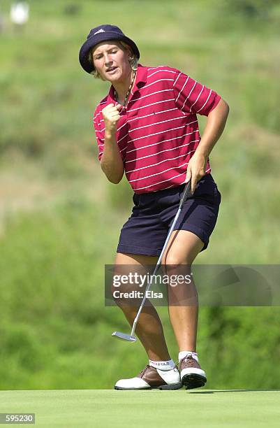 Nicole Perrot of Chile pumps her fist during her semifinal match with Joo-Mi Kim in the 2001 us Women's Amateur Championship at Flint Hills National...