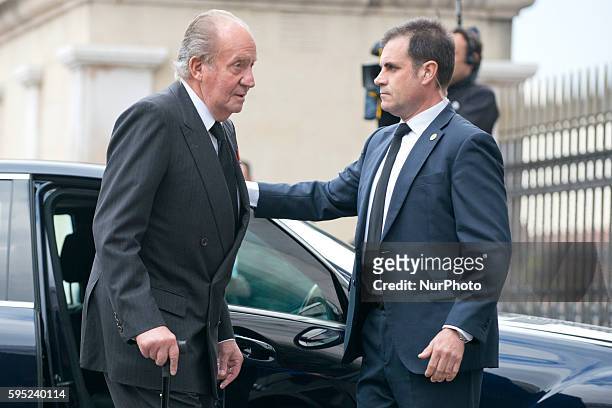 King Juan Carlos of Spain attend the state funeral for former Spanish prime minister Adolfo Suarez at the Almudena Cathedral on March 31, 2014 in...