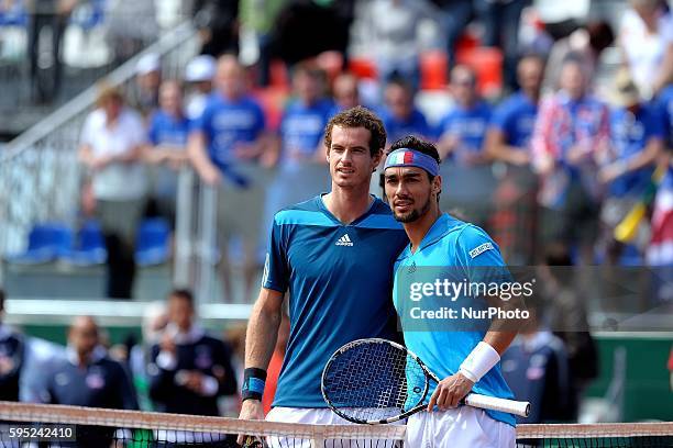 Fabio Fognini of Italy and Andy Murray of Great Britain during day three of the Davis Cup World Group Quarter Final match between Italy and Great...