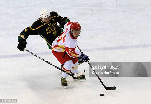 Cheng Zang and Jack Valadas in the match between South Africa and China, corresponding to the first day of Group B of the World Ice Hockey match at...