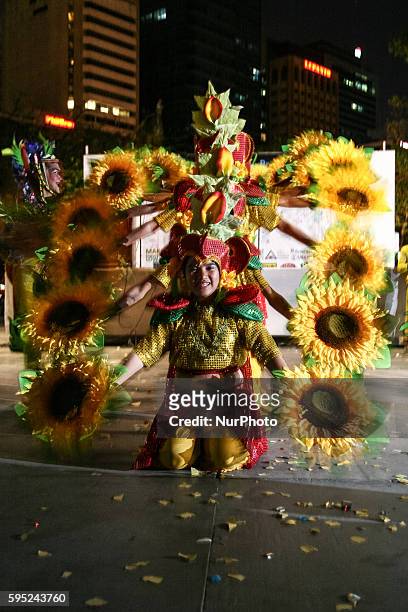 Student dancers perform an environmental dance during the commemoration of the Earth Hour in Makati City. -- Hundreds of Earth Hour advocates...