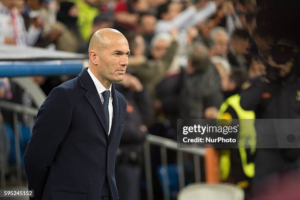 Real Madrids French trainer Zidane in action during the Champions league football match Real Madrid CF vs Roma at the Santiago Bernabeu stadium in...