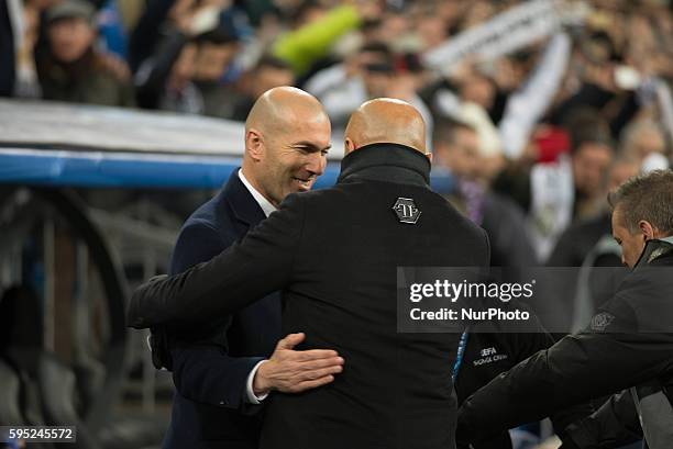 Real Madrid's French trainer Zidane and Romas Italian trainer Spalletti in action during the Champions league football match Real Madrid CF vs Roma...