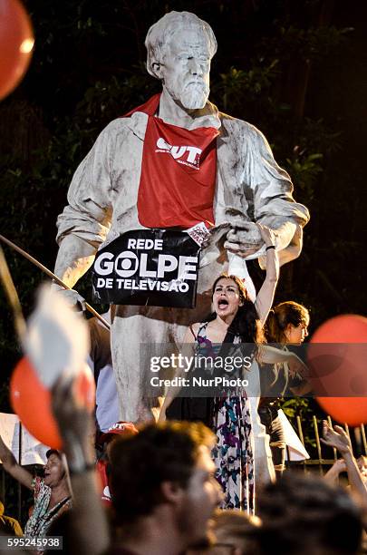 Activists demonstrate in support of the Workers' Party and former Brazilian Prersident Luiz Inacio Lula da Silva at Esplanada dos Ministerios in...