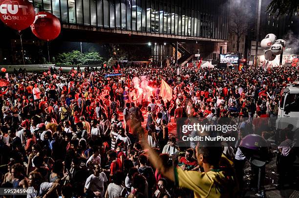 Activists demonstrate in support of the Workers' Party and former Brazilian Prersident Luiz Inacio Lula da Silva at Esplanada dos Ministerios in...