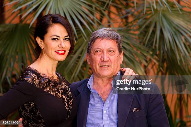 Actress Maria Grazia Cucinotta with Tony Sperandeo attends &quot;'The Tailor's Wife&quot; photocall in Rome -