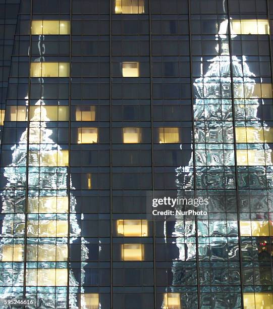 Reflexion of Petronas Twin towers in Kuala Lumpur City. Kuala Lumpur, Malaysia, on 23th March 2016.