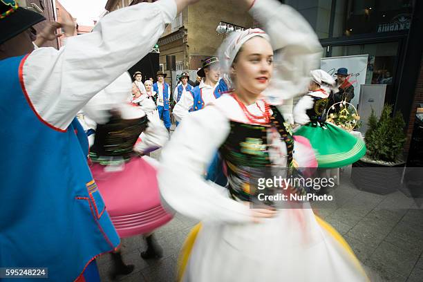 March 2016 - Folk dancers from the Kujawsko-Pomorka region perform at an Easter fair near the old market square on Sunday.