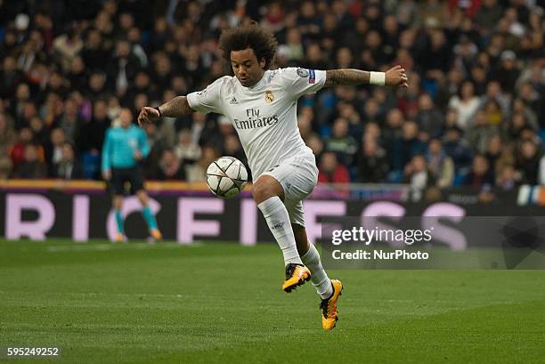 Real Madrids Brazilian Marcelo in action during the Champions league football match Real Madrid CF vs Roma at the Santiago Bernabeu stadium in Madrid...
