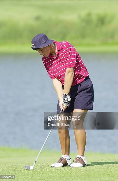 Nicole Perrot of Chile hits a shot during her semifinal match with Joo-Mi Kim during the 2001 US Women's Amateur Championship at Flint Hills National...