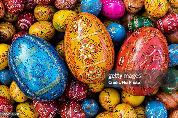 Popular traditional Polish pisanki, hand painted Easter eggs, on display in Krakow's Easter Market. Polish pisanka are eggs richly ornamented using...