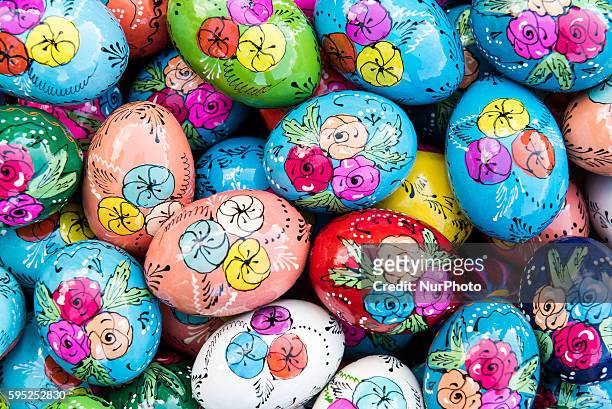 Popular traditional Polish pisanki, hand painted Easter eggs, on display in Krakow's Easter Market. Polish pisanka are eggs richly ornamented using...