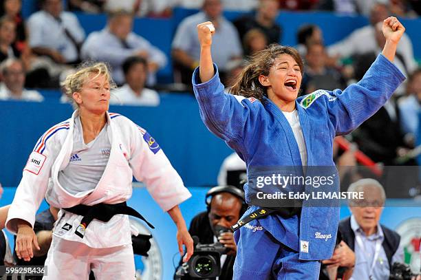 Sarah Menezes of Brazil wins against Frederique Jossinet of France during the bronze medal match of the women's 48kg category of the World Judo...