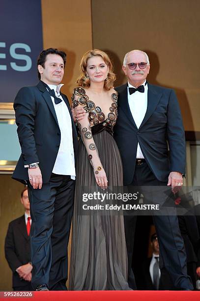 Actor Oleg Menshikov, actress Nadezhda Mihalkova and director Nikita Mikhalkov at the premiere of ?The Exodus - Burnt By The Sun 2? during the 63rd...