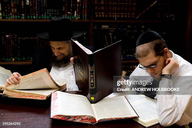 Orthodox Jewish scholars study the Talmud at the Yeshiva Kol Yaakov in Monsey, New York.