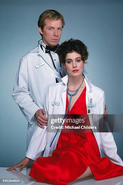 American actors Michael McKean and Sean Young on the set of Young Doctors in Love by director, screenwriter, producer and actor Gary Marshall.