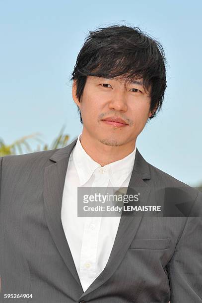 Joonsang Yu at the photo call for ?Ha Ha Ha? during the 63rd Cannes International Film Festival.